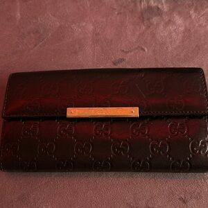 Authentic GUCCI Wallet. Lots of room for cards.